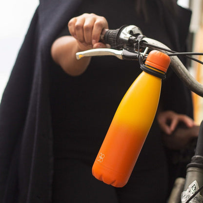 Sunrise Yellow/Orange Water Bottle Hanging on a Bike