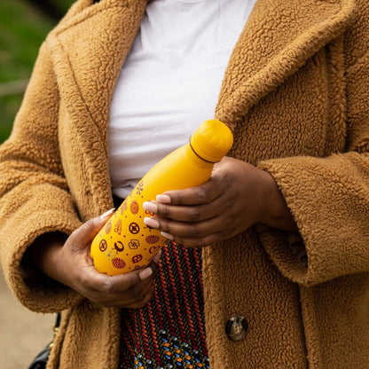Lady holds Yellow Stainless Steel Water Bottle